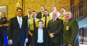 Sheriff James Woodruff, Randy Robertson, Geoff Duncan, Ryder Duncan, and others, stand with some of the Sheriff’s Office that were recipients of Valor Awards. 2019 Chamber Breakfast and Valor Awards