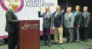 Sheriff James Woodruff being sworn in as the Georgia Sheriffs' Youth Homes Board Second Vice President.